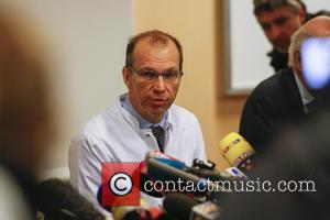 Professor Emmanuel Gay gives a press conference about Michael Schumacher's health condition on December 30, 2013 at the Centre Hospitalier...