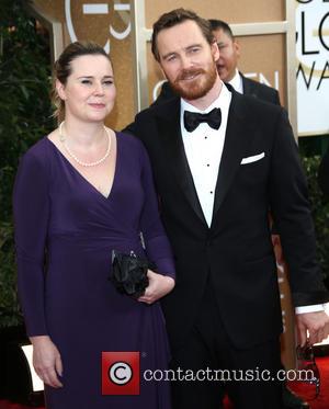 Michael Fassbender and sister - 71st Annual Golden Globes - Red Carpet Arrivals - Los Angeles, California, United States -...