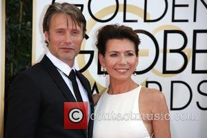 Mads Mikkelsen and Hanne Jacobsen - 71st Annual Golden Globe Awards held at The Beverly Hilton Hotel  - Red...