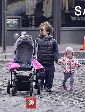 Peter Dinklage and Zelig Dinklage - Peter Dinklage walking with daughter Zelig on a mild day in Manhattan - New...