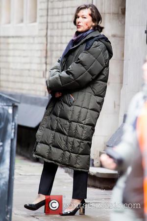 Milla Jovovich - On the set of new film 'Survivor' in Central London - London, United Kingdom - Saturday 25th...