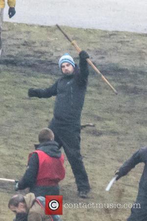 Michael Fassbender - Michael Fassbender is seen practising a battle scene with extras on the set of the new movie...