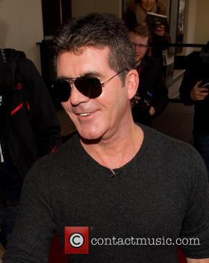 Simon Cowell Disccuses More Children In The Future In First Interview Since Baby Eric's Birth 