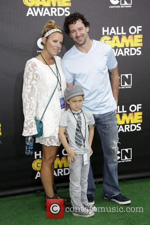 Justin Williams and family - Cartoon Network's Hall of Game Awards at The Barker Hangar - Arrivals - Los Angeles,...