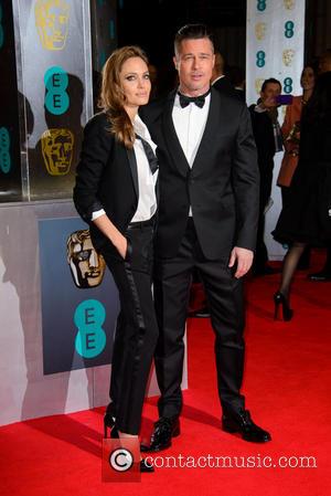 Angelina Jolie and Brad Pitt - EE British Academy Film Awards (BAFTA) 2014 held at the Royal Opera House -...