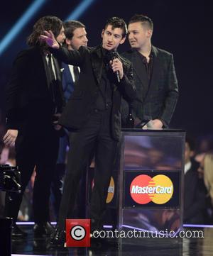 Arctic Monkeys - The BRIT Awards 2014 - Performances and...