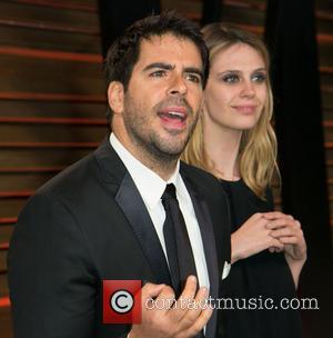 Eli Roth and Guest - 2014 Vanity Fair Oscar Party held at Sunset Tower in West Hollywood - Arrivals -...