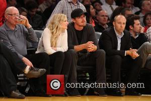 Kirsten Dunst and Garrett Hedlund - Celebrities courtside at the Los Angeles Lakers v New Orleans Pelicans NBA basketball game...