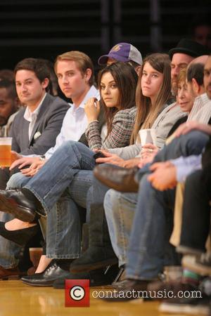 Mila Kunis - Celebrities courtside at the Los Angeles Lakers v New Orleans Pelicans NBA basketball game at the Staples...
