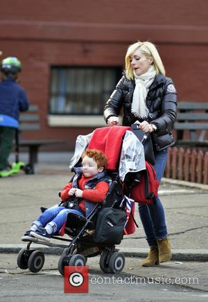 Jane Krakowski and Bennett - Jane Krakowski pushes her son Bennett in a stroller while out and about in Manhattan...