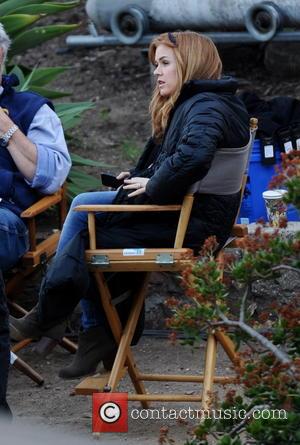 Isla Fisher - Isla Fisher shows off her huge pregnant belly bump while on the set of her new movie...