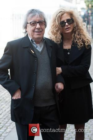Bill Wyman and Guest - David Frost - memorial unveiling and service of remembrance held at Westminster Abbey - Arrivals....