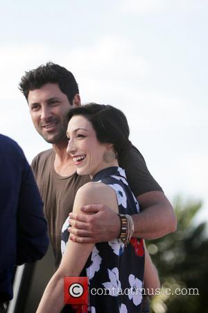 Meryl Davis and Maksim Chmerkovskiy - Dancing with the Stars celebrities appear on 'Extra' at Universal Studios - Los Angeles,...