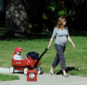 Jenna Fischer, Weston and Weston Kirk - Heavily pregnant Jenna Fischer takes a morning stroll with son Weston, riding in...