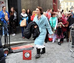 Saoirse Ronan - Actress Saoirse Ronan returning back onset wearing a dressing gown with a nightdress underneath, on the first...