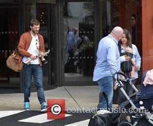 Jamie Dornan, Amelia Warner and daughter - The day after The IFTA awards, actors are seen coming and going from...