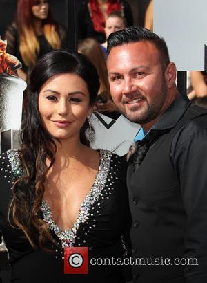 Jenni 'Jwoww' Farley and Roger Mathews - 23rd Annual MTV Movie Awards at the Nokia Theatre - Arrivals - Los...