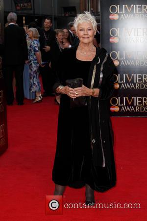 Dame Judi Dench - The Olivier Awards 2014 with MasterCard held at the Royal Opera House - Arrivals - London,...