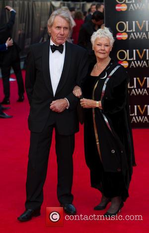 Dame Judi Dench - The Laurence Olivier Awards 2014 held at the Royal Opera House - Arrivals - London, United...