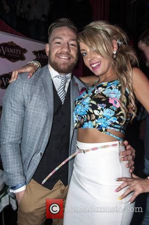 Leonie Carbery and Conor McGregor - UFC superstar Conor McGregor takes time out from training and recuperation from his knee...