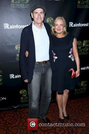 Kim Smedvig and James Taylor - the 25th Anniversary Rainforest Fund Benefit at Mandarin Oriental Hotel on April 17, 2014...