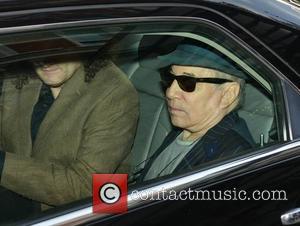 Paul Simon and Martin Hayes - Paul Simon seen leaving The Shelbourne Hotel with Irish fiddle virtuoso Martin Hayes to...