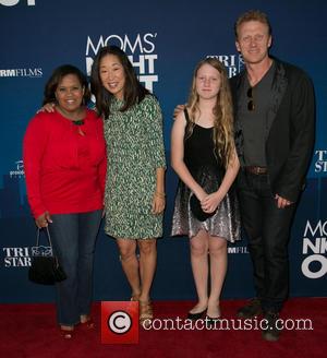 Chandra Wilson, Sandra Oh, Guest and Kevin McKidd - Moms Night Out Premiere at TCL Chinese Theater - Red Carpet...