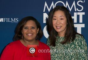 Chandra Wilson and Sandra Oh - Moms Night Out Premiere at TCL Chinese Theater - Red Carpet - Los Angeles,...