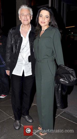 Adam Clayton and Mariana Teixeira - U2 bassist Adam Clayton and his wife Mariana Teixeira arrive at RTE studios for...