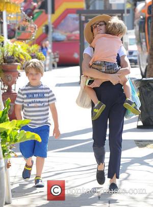 Julie Bowen, Oliver Phillips and John Phillips - Julie Bowen and her three sons enjoy a morning together at a...