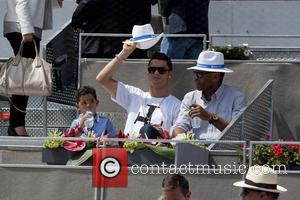 Cristiano Ronaldo, Cristiano Junior and Cristiano Jr - Real Madrid football player Cristiano Ronaldo with his son at the Mutua...