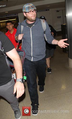 Seth Rogen - Seth Rogen arrives at Los Angeles International...