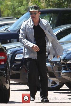 Bono - George Clooney and his fiancé Amal Alamuddin  exit Cafe Habana after spending Mother's Day dining with Bono....