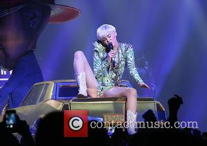 Miley Cyrus - Miley Cyrus performing live on stage in her 'Bangerz' tour at Manchester Phones4U Arena - Manchester, United...