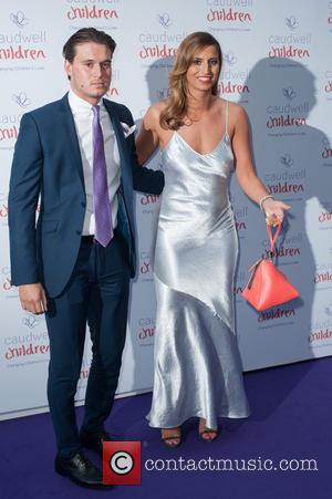 Ferne McCann and Charlie Sims - The 2014 Caudwell Butterfly Ball held at Grosvenor House - Arrivals. - London, United...