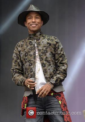 Pharrell Williams Apologizes For Sporting Native American Headdress On Elle UK Cover