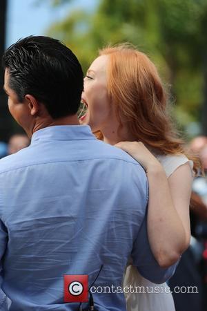 Deborah Ann Woll and Mario Lopez - Deborah Ann Woll appears on Extra hosted by Mario Lopez. Deborah pretends to...