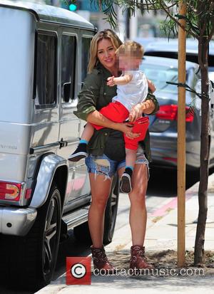 Hilary Duff and Luca Cruz Comrie - Hilary Duff, with iced tea in hand, leaves lunch at Joan's On Third...