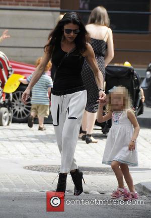 Bethenny Frankel and Bryn Hoppy - Bethenny Frankel dressed in a black top with white bottoms, goes on the school...