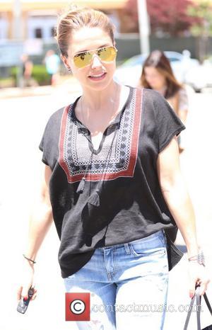 Sophia Bush - Sophia Bush out and about in West Hollywood wearing an American. Indian themed top and carrying her...