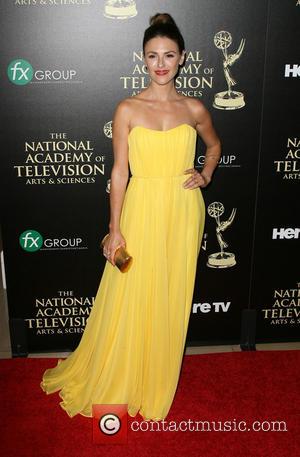 Elizabeth Hendrickson - 2014 Daytime Emmy Awards - Arrivals held at Beverly Hilton Hotel - Los Angeles, California, United States...