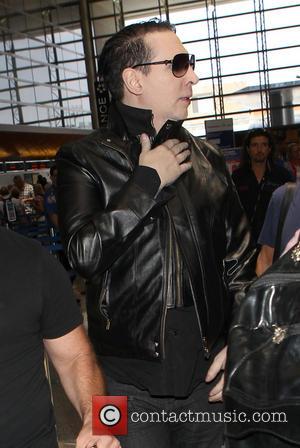 Marilyn Manson and Brian Hugh Warner - Marylin Manson (real name Brian Hugh Warner) arrives at Los Angeles International Airport...