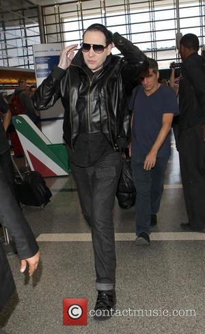 Marilyn Manson and Brian Hugh Warner - Marylin Manson (real name Brian Hugh Warner) arrives at Los Angeles International Airport...