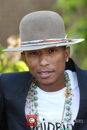 Pharrell Williams Surprises Glamorous Guests At Serpentine Galleries' Summer Party