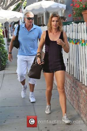 Dolph Lungren - Dolph Lundgren leaves Ivy restaurant with female  and looks shy about being caught, then walks into...