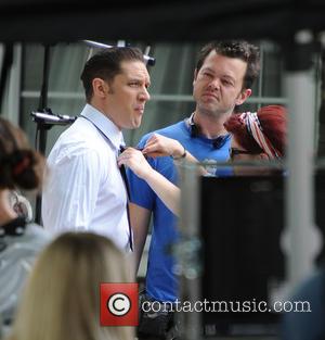 Tom Hardy - Tom Hardy and Emily Browning on set of the film 'Legend' in East London - London, United...