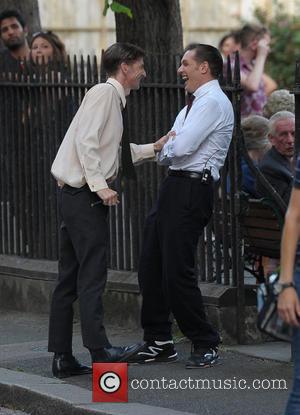 Tom Hardy and Paul Anderson - Tom Hardy shoots scenes for his latest film, 'Legend,' in Hackney. Tom joked around...