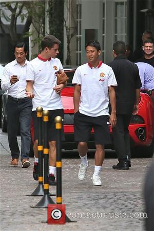 Shinji Kagawa - Manchester United players leaving the Beverly Wilshire Hotel ahead of a training session at the StubHub Center...