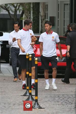 Shinji Kagawa - Manchester United players leaving the Beverly Wilshire Hotel ahead of a training session at the StubHub Center...