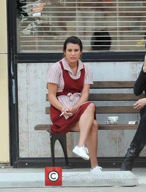 Lea Michele - Lea Michelle is seen wearing a waitress outfit and smoking cigarettes with co-star Katey Sagal outside a...